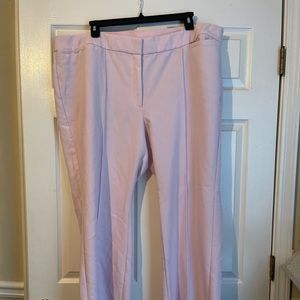 Light pink wide leg trousers.